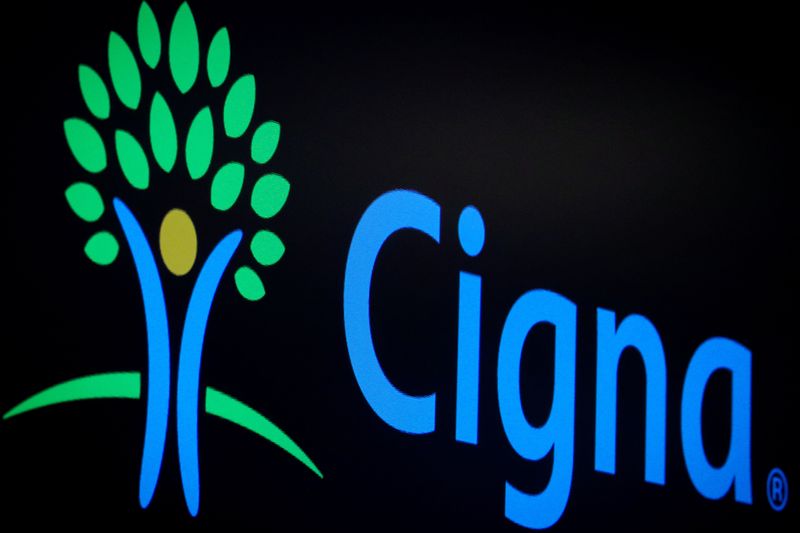 &copy; Reuters. A screen displays the logo fro Cigna Corp. on the floor at the New York Stock Exchange (NYSE) in New York, U.S., July 16, 2019. REUTERS/Brendan McDermid/ File Photo