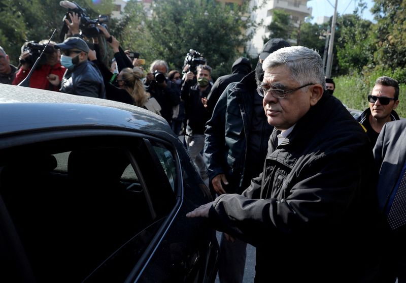 &copy; Reuters. FILE PHOTO: Leader of the far-right Golden Dawn party Nikos Mihaloliakos is escorted as he leaves his home, after the party was declared a criminal organisation by a court in Athens, Greece, October 22, 2020. REUTERS/Costas Baltas/File Photo