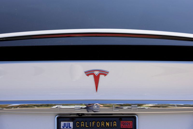 &copy; Reuters. FILE PHOTO: A Tesla Model X is shown at a Tesla service center in Costa Mesa, California, U.S., October 20, 2020.   REUTERS/Mike Blake/File Photo