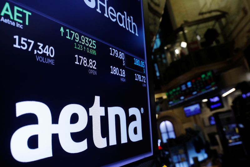 &copy; Reuters. A logo of Aetna is displayed on a monitor above the floor of the New York Stock Exchange shortly after the opening bell in New York, U.S., December 5, 2017.  REUTERS/Lucas Jackson/File Photo