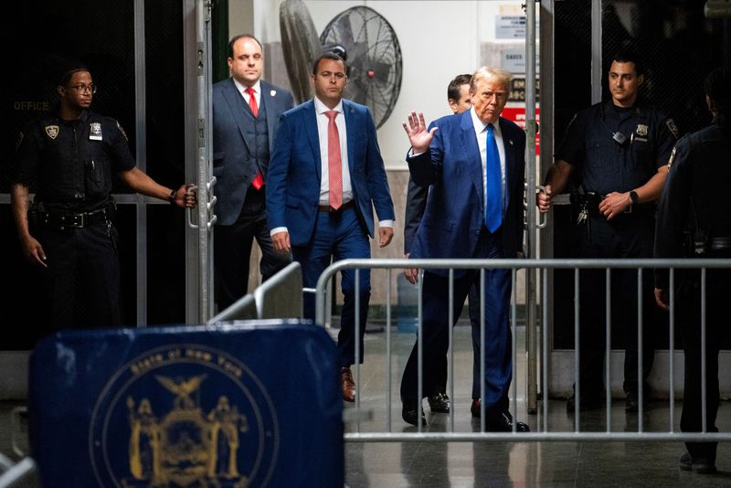 &copy; Reuters. Republican presidential candidate, former U.S. President Donald Trump walks into the courtroom following a lunch break during the proceedings in his criminal trial at the New York State Supreme Court in New York, New York, Friday, May, 3, 2024. Doug Mills