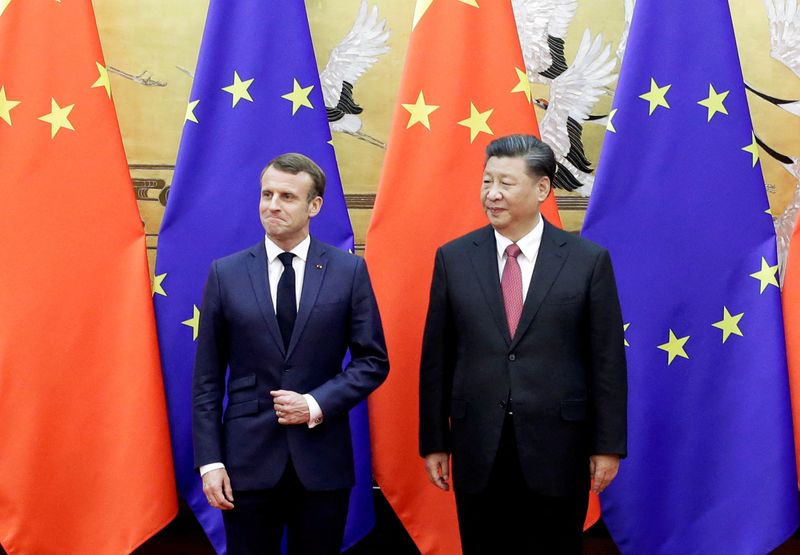 &copy; Reuters. FILE PHOTO: Chinese President Xi Jinping and French President Emmanuel Macron stand in front of Chinese and EU flags at a signing ceremony inside the Great Hall of the People in Beijing, China November 6, 2019.  REUTERS/Jason Lee/Pool/File Photo