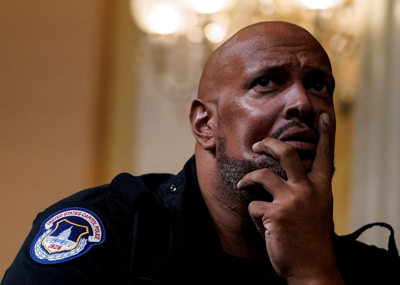 &copy; Reuters. FILE PHOTO: U.S. Capitol Police officer Harry Dunn watches a video played during a public hearing of the U.S. House Select Committee to investigate the January 6 Attack on the U.S. Capitol, on Capitol Hill in Washington, U.S., October 13, 2022. REUTERS/El
