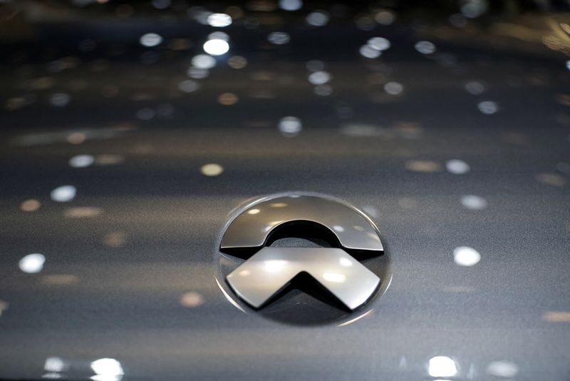 &copy; Reuters. FILE PHOTO: A logo of Nio is pictured on its car at the Beijing International Automotive Exhibition, or Auto China 2024, in Beijing, China, April 25, 2024. REUTERS/Tingshu Wang/File Photo