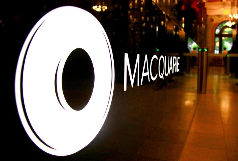 &copy; Reuters. FILE PHOTO: The logo of Australian investment bank Macquarie Group adorns a desk in the reception area of its headquarters in Sydney, Australia, Oct. 28, 2016. REUTERS/David Gray/File Photo