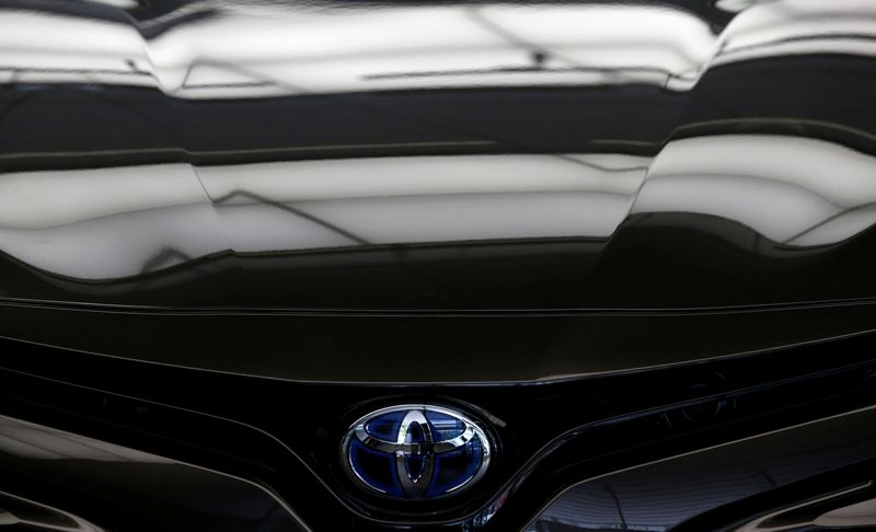&copy; Reuters. Toyota's logo on its Camry model is pictured at its head office in Tokyo, Japan August 4,  2017. REUTERS/Kim Kyung-Hoon/File Photo