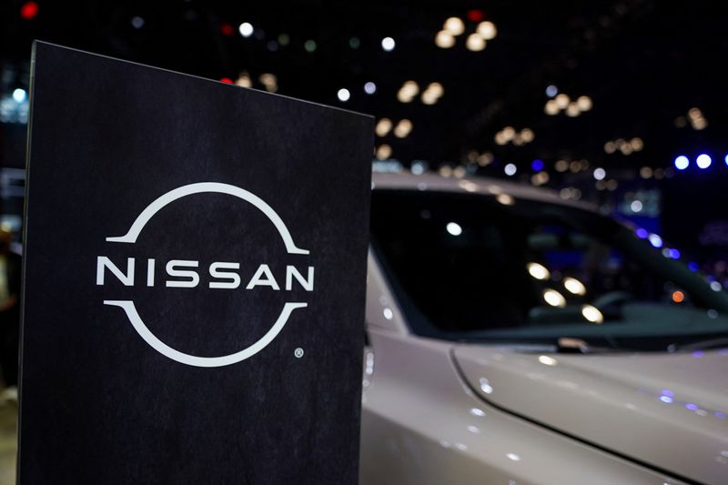 &copy; Reuters. FILE PHOTO: A Nissan logo is seen next to a vehicle during the New York International Auto Show, in Manhattan, New York City, U.S., April 5, 2023. REUTERS/David 'Dee' Delgado/File Photo