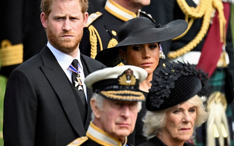 &copy; Reuters. FILE PHOTO: Britain's Meghan, Duchess of Sussex, cries as she, Prince Harry, Duke of Sussex, Queen Camilla and King Charles attend the state funeral and burial of Britain's Queen Elizabeth, in London, Britain, September 19, 2022. REUTERS/Toby Melville/Fil