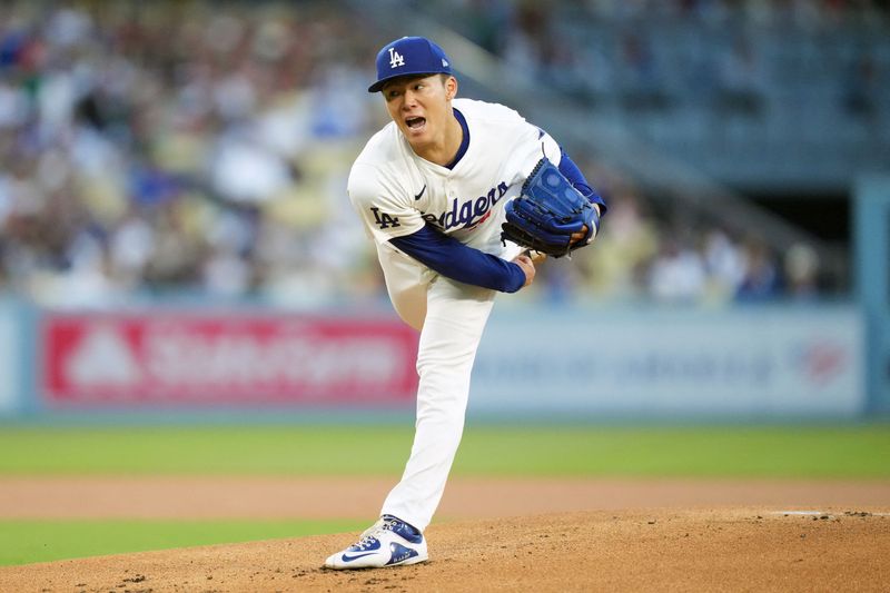 &copy; Reuters. ＭＬＢは７日、各地で試合を行い、大谷翔平選手と山本由伸投手（写真）の所属するドジャースはマーリンズを８─２で下した（２０２４年　ロイター/USA TODAY Sports）