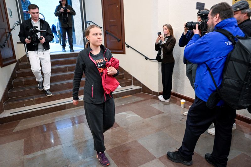 &copy; Reuters. Greta Thunberg arrives at the Stockholm district court, which is holding the main hearing in the case where the climate activist is charged with two cases of disobedience to the authorities after protest actions at the Riksdag, in Stockholm, Sweden, May 8