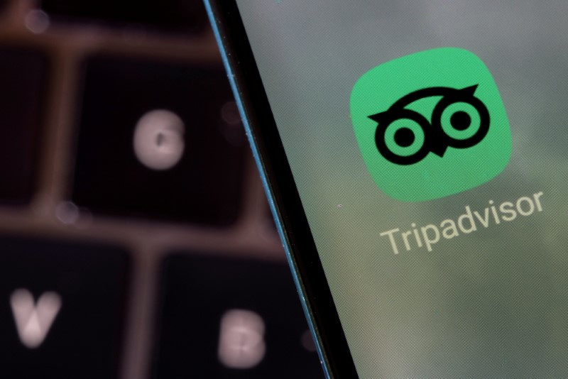 &copy; Reuters. FILE PHOTO: Tripadvisor app is seen on a smartphone in this illustration taken February 27, 2022. REUTERS/Dado Ruvic/Illustration/File Photo
