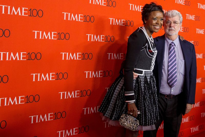 &copy; Reuters. FILE PHOTO: Director George Lucas and his wife Mellody Hobson arrive for the TIME 100 Gala in New York, April 21, 2015.   REUTERS/Brendan McDermid/File Photo