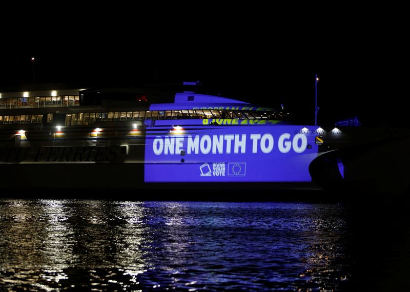 &copy; Reuters. A projection marking Europe Day with a message encouraging people to vote in June's European Parliamentary elections is seen on a catamaran ferry passing in front of the medieval Fort St Angelo in Valletta's Grand Harbour, Malta May 8, 2024.  REUTERS/Darr