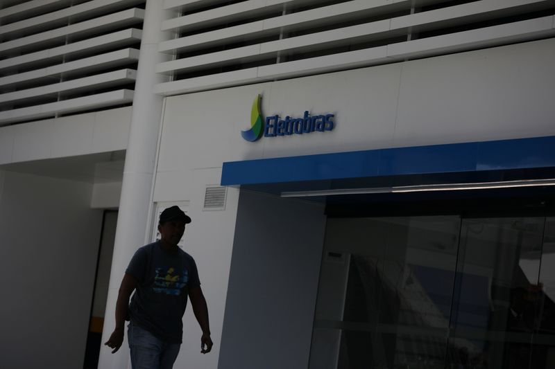 &copy; Reuters. A person walks past in front of the headquarters of Brazil's power company Eletrobras in Rio de Janeiro, Brazil January 3, 2019. REUTERS/Pilar Olivares/File Photo