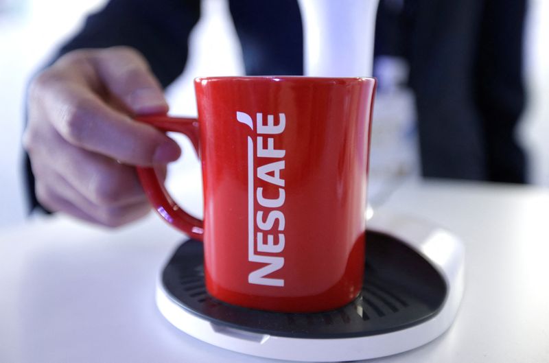 &copy; Reuters. An employee holds a Nescafe cup at Nestle R&D Center in Beijing, China, March 25, 2019. Picture taken March 25, 2019. REUTERS/Jason Lee/File photo