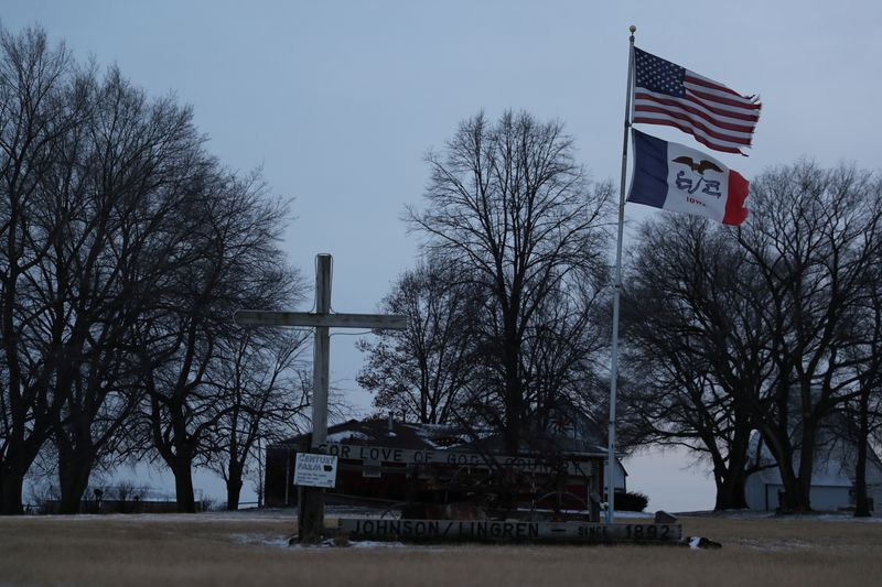 &copy; Reuters. File photo: A cross and flags are seen near Ogden Adel, Iowa, U.S., January 16, 2020. REUTERS/Ivan Alvarado/File photo