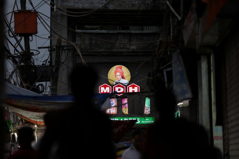 &copy; Reuters. FILE PHOTO: A view of the logo of MDH, an Indian spice manufacturing company, on a shop in the old quarters of Delhi, India, May 3, 2024. REUTERS/Anushree Fadnavis/File Photo