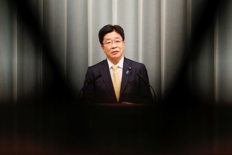 &copy; Reuters. FILE PHOTO: Japan's new Chief of Cabinet Secretary Katsunobu Kato announces new cabinet members at a news conference in Tokyo, Japan, September 16, 2020. REUTERS/Kim Kyung-Hoon/File Photo