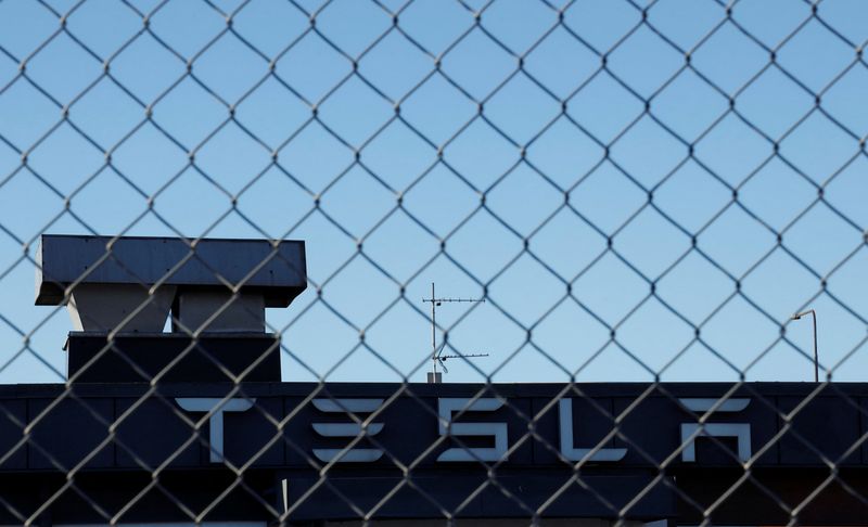 &copy; Reuters. A Tesla sign is displayed over a Tesla showroom in Malmo, Sweden, December 14, 2023. REUTERS/ Tom Little/File Photo