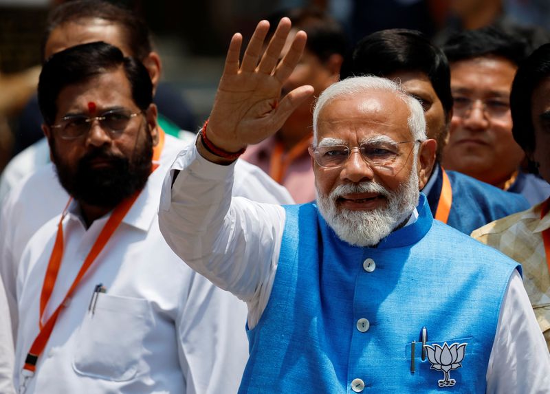 &copy; Reuters. India's Prime Minister Narendra Modi gestures as he walks on the day he files his nomination papers for the general elections in Varanasi, India May 14, 2024. REUTERS/Adnan Abidi