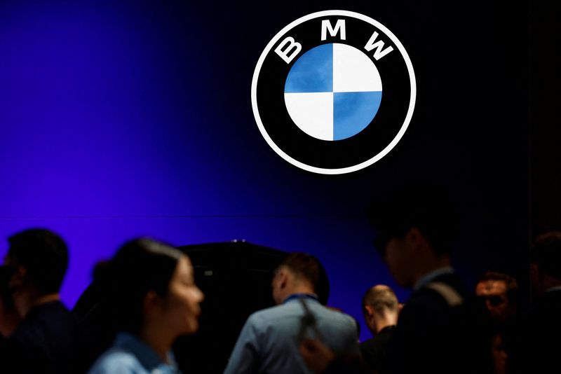&copy; Reuters. FILE PHOTO:Visitors walk past a BMW logo at the Beijing International Automotive Exhibition, or Auto China 2024, in Beijing, China, April 25, 2024. REUTERS/Tingshu Wang/File Photo