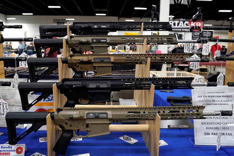 &copy; Reuters. FILE PHOTO: AR-15 rifles are displayed for sale at the Guntoberfest gun show in Oaks, Pennsylvania, U.S., October 6, 2017.   REUTERS/Joshua Roberts/File Photo