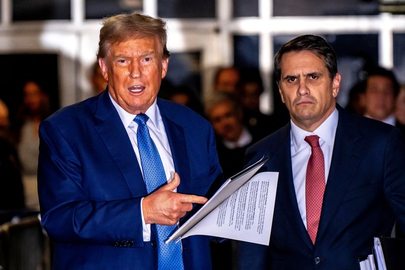 &copy; Reuters. FILE PHOTO: Former U.S. President Donald Trump speaks alongside his attorney Todd Blanche at the end of the day outside the courtroom during his hush money trial at Manhattan Criminal Court in New York City, New York, U.S. May 20, 2024. Mark Peterson/Pool