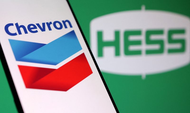&copy; Reuters. Chevron and Hess logos are seen in this illustration taken, October 23, 2023. REUTERS/Dado Ruvic/Illustration/File Photo