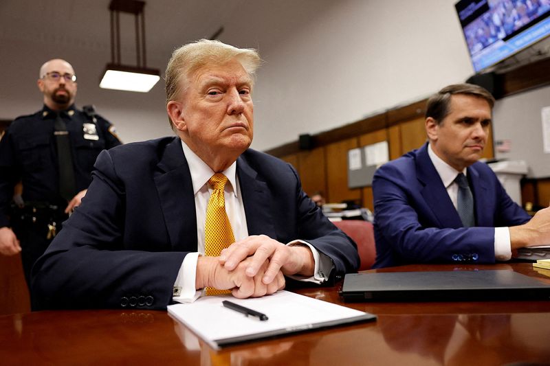 &copy; Reuters. Former U.S. President Donald Trump sits in the courtroom at Manhattan Criminal Court with attorney Todd Blanche on May 21, 2024 in New York City. Michael M. Santiago/Pool via REUTERS