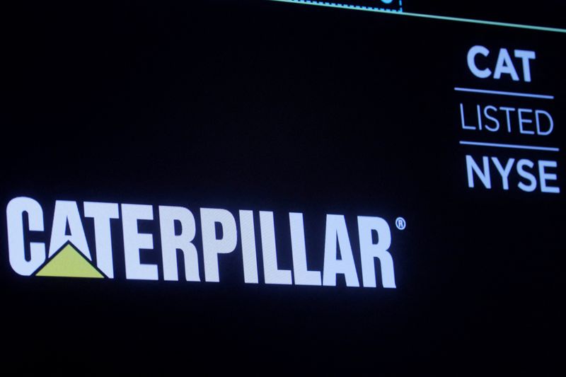 &copy; Reuters. FILE PHOTO: The company logo for Caterpillar Inc. is displayed on a screen at the New York Stock Exchange (NYSE) in New York, U.S., December 17, 2019. REUTERS/Brendan McDermid/File Photo