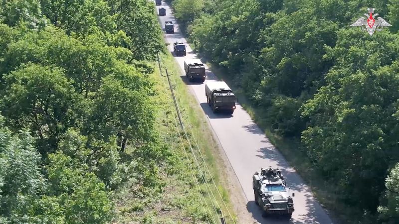 © Reuters. Russian military vehicles are seen during the first stage of drills, involving practical training in the preparation and use of non-strategic nuclear weapons, at an unknown location in Russia's Southern Military District, in this still image taken from video released May 21, 2024. Russian Defence Ministry/Handout via REUTERS