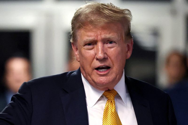 &copy; Reuters. FILE PHOTO: Former U.S. President Donald Trump speaks at the end of the day during his hush money trial at Manhattan Criminal Court in New York City, New York, U.S. May 21, 2024. Michael M. Santiago/Pool via REUTERS/File Photo