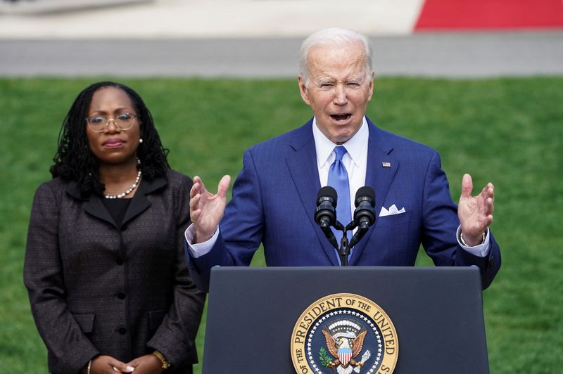 &copy; Reuters. FILE PHOTO: U.S. President Joe Biden delivers remarks on Judge Ketanji Brown Jackson?s confirmation as the first Black woman to serve on the U.S. Supreme Court, as she stands at his side during a celebration event on the South Lawn at the White House in W