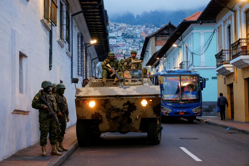 &copy; Reuters. FILE PHOTO: Soldiers in an armored vehicle patrol the city's historic center following an outbreak of violence a day after Ecuador's President Daniel Noboa declared a 60-day state of emergency following the disappearance of Adolfo Macias, leader of the Lo