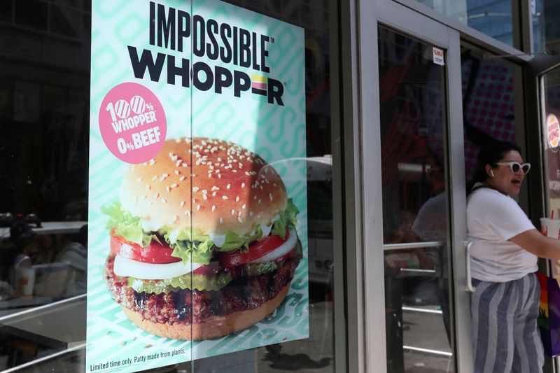 &copy; Reuters. FILE PHOTO: A sign advertising the soy based Impossible Whopper is seen outside a Burger K/File Photoing in New York, U.S., August 8, 2019. REUTERS/Shannon Stapleton