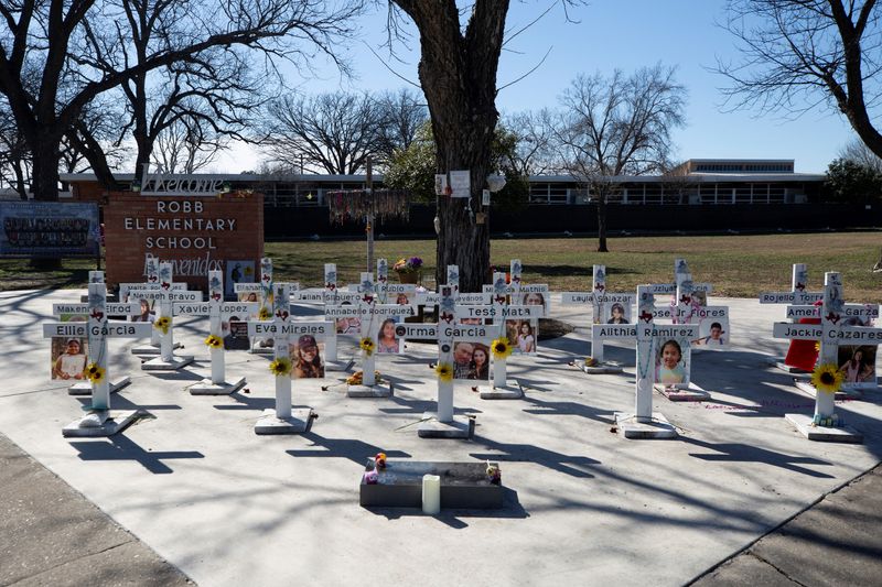 &copy; Reuters. Memorial crosses stand in front of Robb Elementary School, as U.S. Attorney General Merrick Garland announces the results of a review into the law enforcement response to a 2022 mass shooting in Uvalde, Texas, U.S., January 18, 2024. REUTERS/Kaylee Greenl