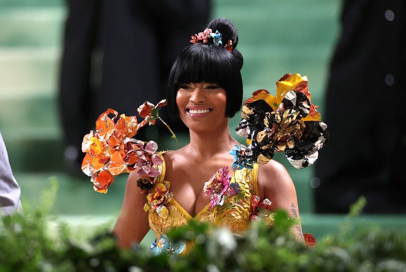 © Reuters. Nicki Minaj poses at the Met Gala, an annual fundraising gala held for the benefit of the Metropolitan Museum of Art's Costume Institute with this year's theme 'Sleeping Beauties: Reawakening Fashion' in New York City, New York, U.S., May 6, 2024. REUTERS/Carlos Barria/File photo