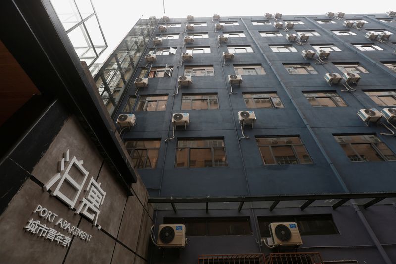 &copy; Reuters. FILE PHOTO: The exterior of a building inside an area with so-called youth apartments by Chinese developer China Vanke in Shenzhen, China April 26, 2017. REUTERS/Bobby Yip/File photo