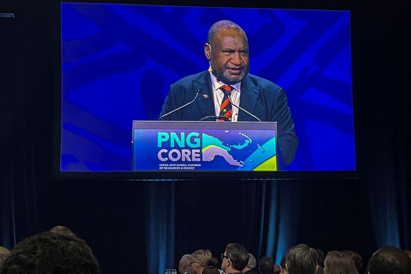 &copy; Reuters. FILE PHOTO: Papua New Guinea Prime Minister James Marape speaks during a Resources and Energy Investment conference in Sydney, Australia, December 11, 2023.REUTERS/Kirsty Needham/File Photo