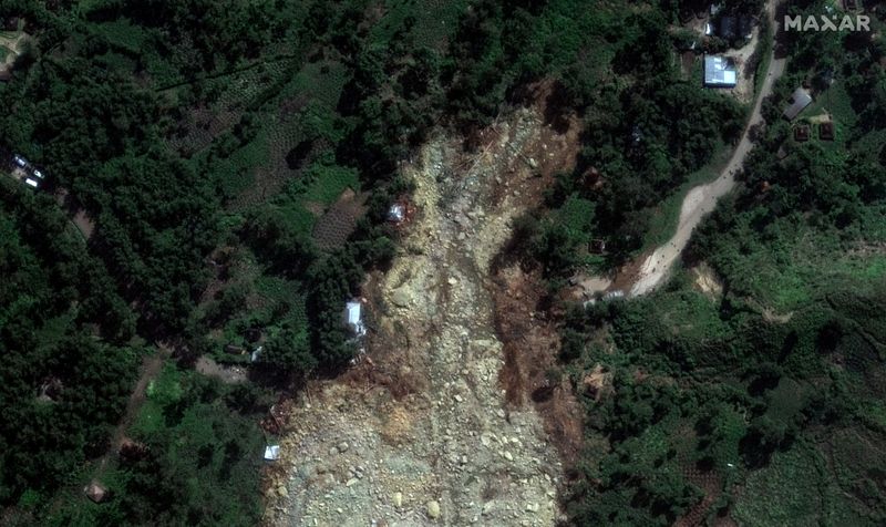 © Reuters. A satellite image shows buried homes after the landslide in Yambali village, Enga Province, Papua New Guinea, May 27, 2024. Maxar Technologies/Handout via REUTERS    