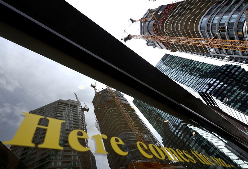 &copy; Reuters. FILE PHOTO: The construction site of "4 Frankfurt" skyscraper is reflected in a shop window in Frankfurt, Germany, July 19, 2023. REUTERS/Kai Pfaffenbach/File Photo