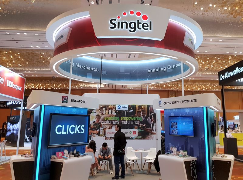 &copy; Reuters. A Singtel booth is pictured at the Money 20/20 Asia Fintech Trade Show in Singapore March 21, 2019. REUTERS/Anshuman Daga