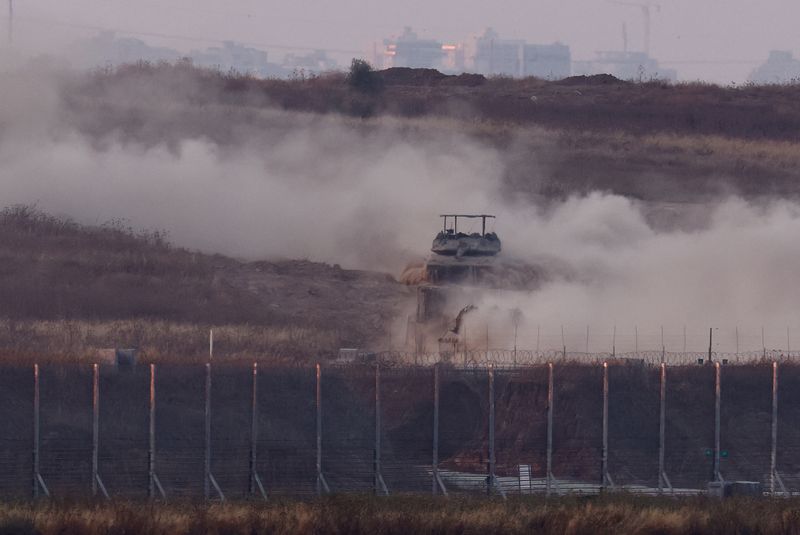 &copy; Reuters. An Israeli tank manoeuvres inside Gaza, amid the ongoing conflict between Israel and the Palestinian Islamist group Hamas, as seen from Israel, May 28, 2024. REUTERS/Amir Cohen