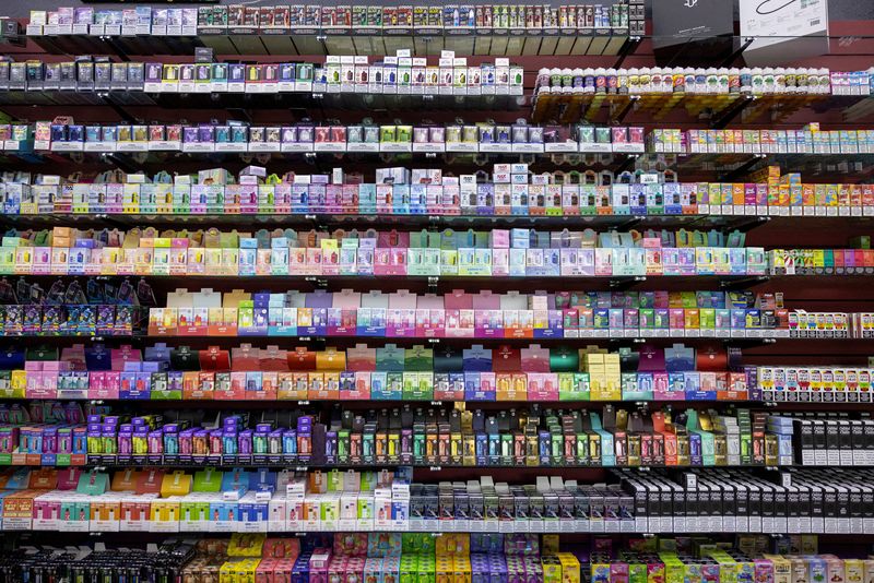 © Reuters. Various vapes, nicotine products and the new Spree Bar, which contains a chemical that mimics nicotine, line the shelves at Sultans' Smoke in Arvada, Colorado, U.S., May 21, 2024. REUTERS/Kevin Mohatt/ File Photo