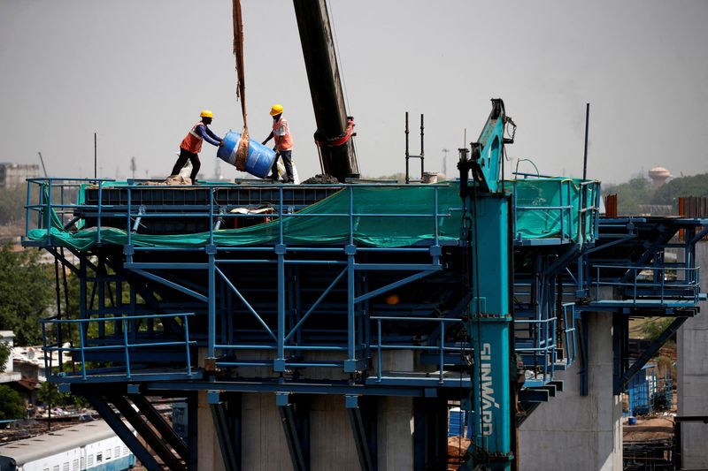 &copy; Reuters. FILE PHOTO: Labourers work at a construction site of the Ahmedabad-Mumbai High Speed Rail corridor in Ahmedabad, India, May 31, 2023. REUTERS/Amit Dave/File Photo