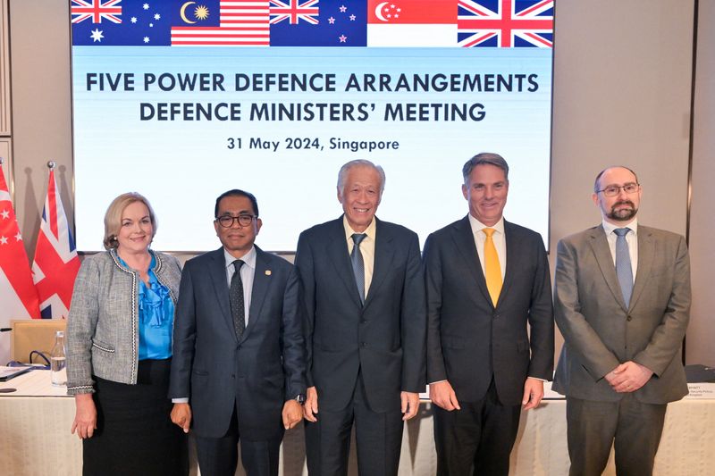 &copy; Reuters. New Zealand's Defence Minister Judith Collins, Malaysia's Defence Minister Dato’ Seri Mohamed Khaled Nordin, Singapore’s Defence Minister Ng Eng Hen, Australia's Deputy Prime Minister and Defence Minister Richard Marles, and Britain’s Director Gener