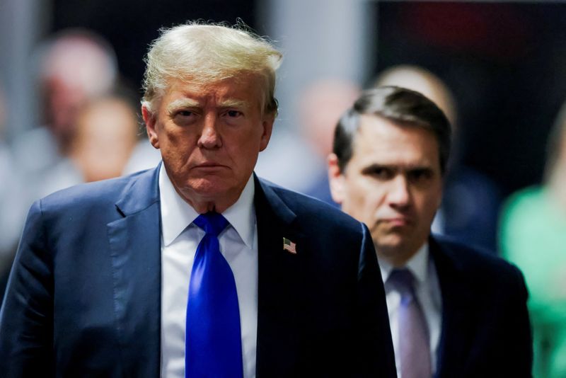 &copy; Reuters. Former US President Donald Trump leaves the courthouse after a jury found him guilty on all 34 counts in his criminal trial in New York State Supreme Court in New York, New York, USA, 30 May 2024. Trump is facing 34 felony counts of falsifying business re