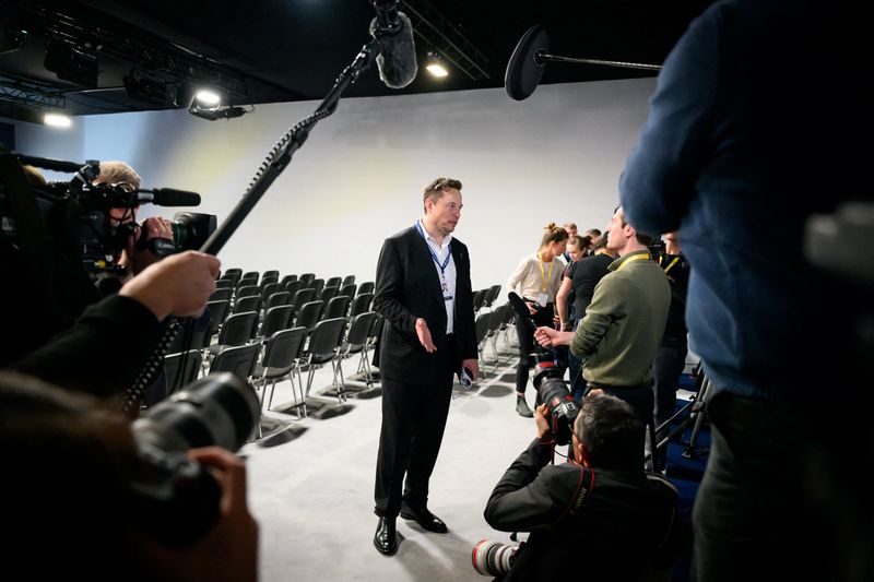 &copy; Reuters. Tesla, X (formerly known as Twitter) and SpaceX's CEO Elon Musk speaks with members of the media during the AI Safety Summit at Bletchley Park in Bletchley, Britain on November 1, 2023.  Leon Neal/Pool via REUTERS