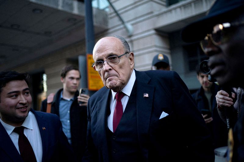 &copy; Reuters. FILE PHOTO: Former New York Mayor Rudy Giuliani departs the U.S. District Courthouse after he was ordered to pay $148 million in his defamation case in Washington, U.S., December 15, 2023. REUTERS/Bonnie Cash/File Photo