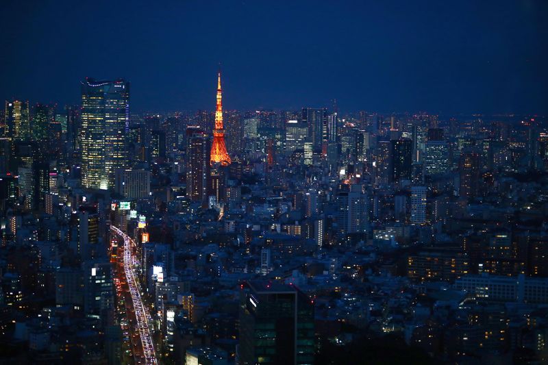 © Reuters. FILE PHOTO: A general view with Tokyo Tower is pictured in Tokyo, Japan March 12, 2020. REUTERS/Hannibal Hanschke/File Photo